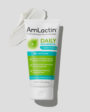 AmLactin Daily Nourish 5% Cream Tube On White Background with Shadow. Cream Swatch Behind Tube